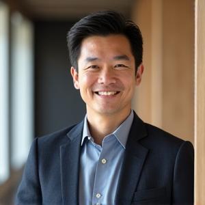 Portrait of Coach Marcus Chen, a confident, encouraging man in his 50s